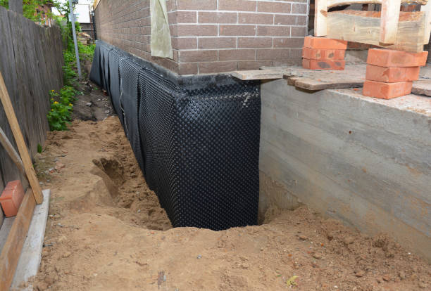 Happy homeowners after waterproofing job in Pendleton